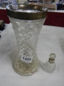 A cut glass vase with silver rim a/f and a silver rimmed scent bottle