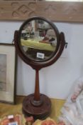 A Victorian mahogany shaving mirror