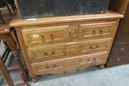 A 2 over 2 chest of drawers