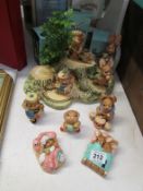 A Pendelfin display stand and 9 rabbits (some boxed)