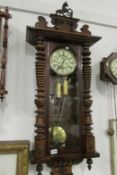 A Victorian twin weight Vienna wall clock