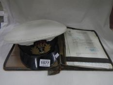 A writing folder & 1964 letters on M.O.D. paper to Eng. Lt. Com. P J Maltby RN and an officer's cap