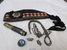A Royal Scots cap and badge, a telescope, whistle etc
