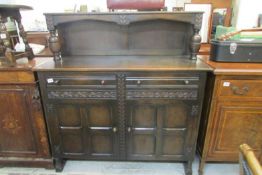 An oak buffet style sideboard