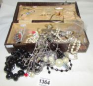 A mixed lot of costume jewellery inc necklaces, earrings etc