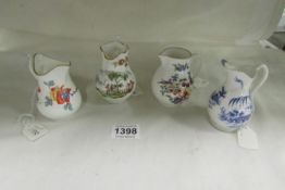 4 Royal Worcester jugs with certificates