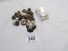 A Dutch coin brooch, quantity of military buttons etc