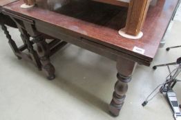 An oak draw leaf table