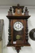 A mahogany wall clock