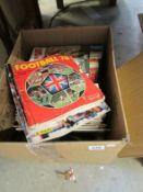 A box of football magazines and books