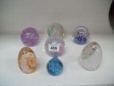 7 Caithness glass paperweights