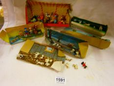 A quantity of Disney celluliod models with cardboard scenes