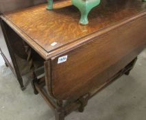 An oak barley twist gate leg table