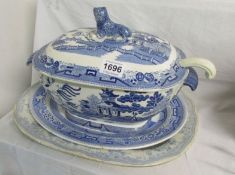 A blue and white tureen and 2 meat plates