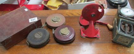3 tape measures, a bean slicer and other tools