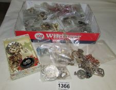 A mixed lot of costume jewellery inc chains, earrings etc