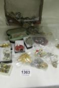 A mixed lot of costume jewellery inc necklaces, watches etc