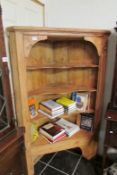 A Georgian pine corner cupboard