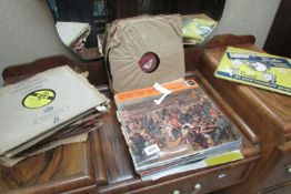 A quantity of 48 RPM records inc Songs from Butlins