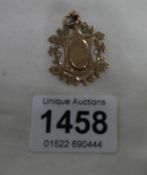 A 9ct gold watch fob