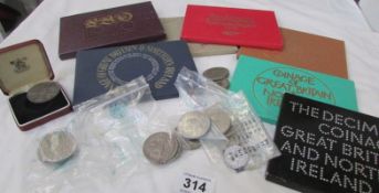 A quantity of coins and coin sets inc George III