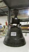 A mid 19C Swiss cow bell in bronze with maker's mark