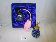 A Mappin & Webb silver top perfume bottle and an Edinburgh crystal atomiser