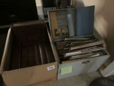 A box of Great War books and a filing box of brochures