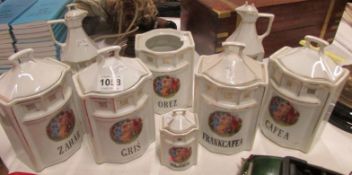 A set of 8 continental storage jars, (1 missing lid)