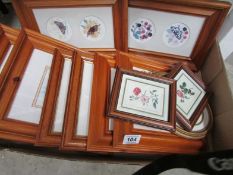 A quantity of framed botanical prints