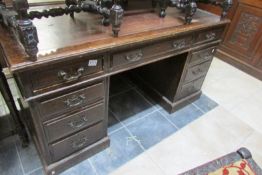 An oak double pedestal desk