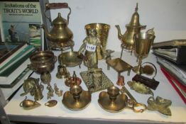 A quantity of brassware