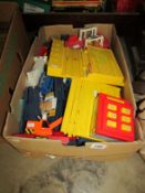 A box of Tomy train items