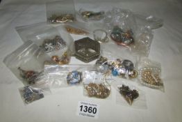A mixed lot of costume jewellery, necklaces, pendants etc