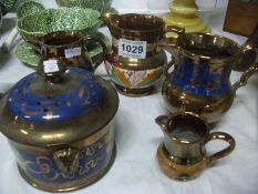 4 Copper lustre jugs and a pot pourri pot