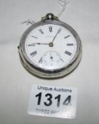 A silver Waltham pocket watch