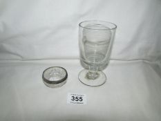 A silver rimmed glass salt and a glass rummer