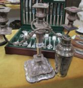 A silver plated candelabra and a cocktail shaker