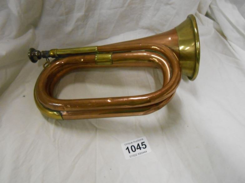 A copper and brass bugle