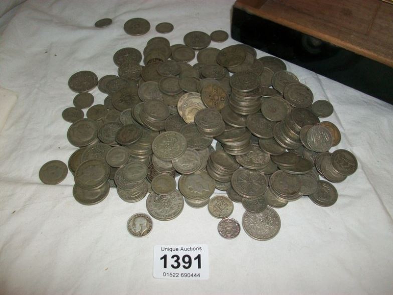 Approximately 1500 grammes of pre-1947 silver coins