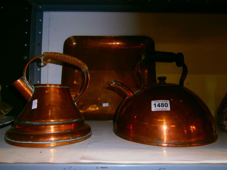 2 copper kettles and a tray