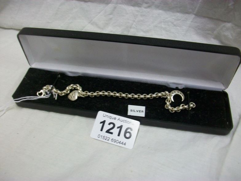 A silver bracelet, 15gms