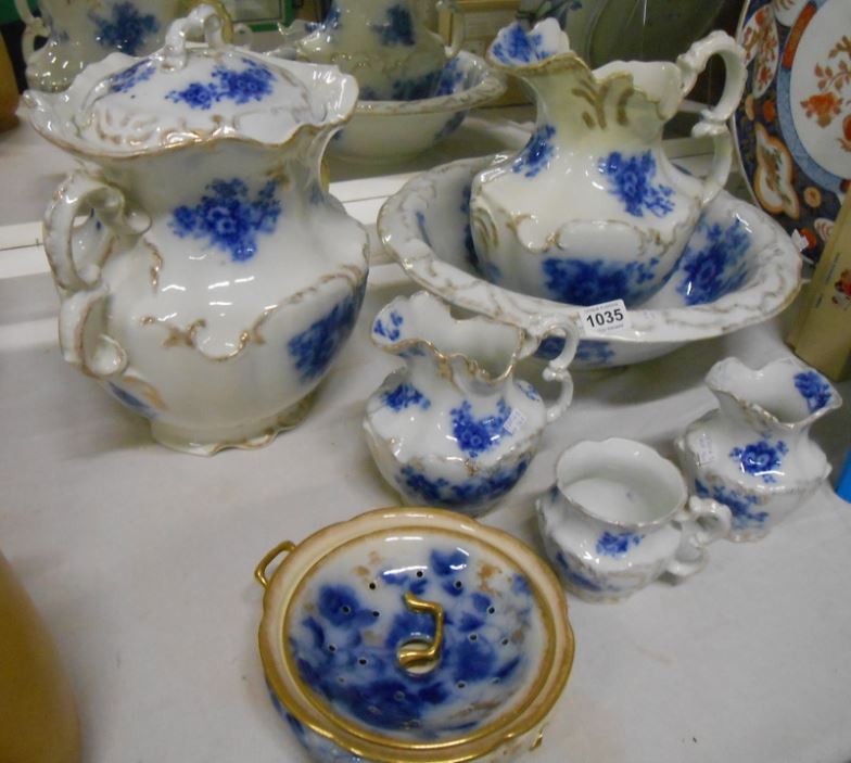 A Victorian Staffordshire flo blue wash set by Trilby (soap dish a/f)