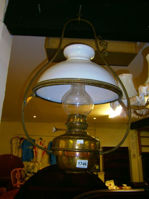 A Victorian brass hanging oil lamp