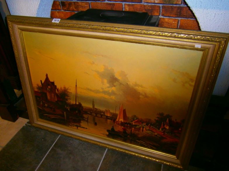 A large gilt framed river scene