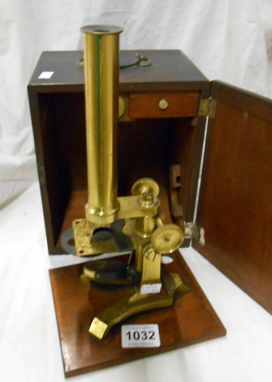 An Arnold & Sons cased microscope