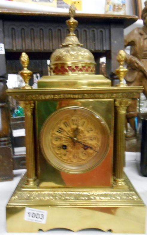 An ornate brass bracket clock