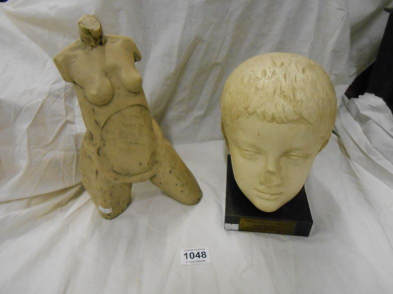 A bust of a young Roman and a torso