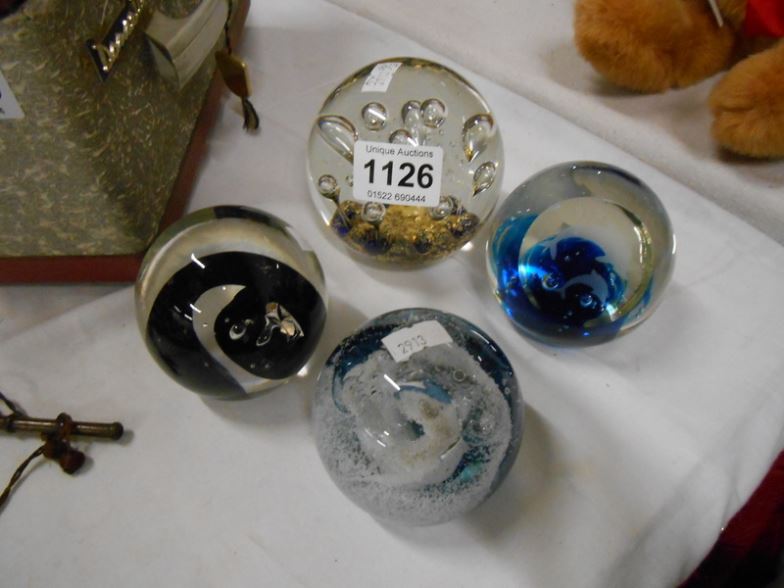 4 glass paperweights