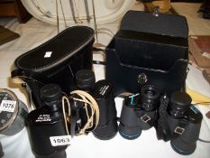 2 cased binoculars